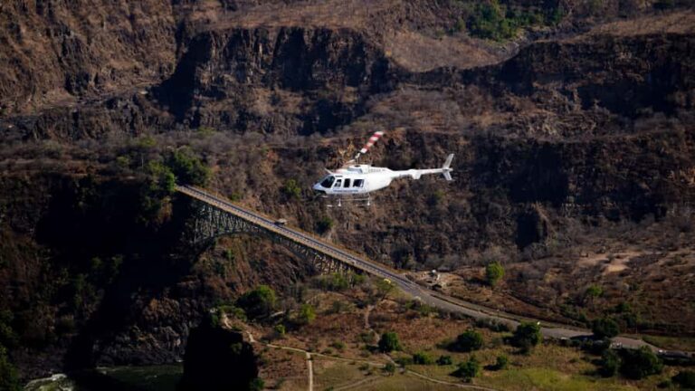Victoria Falls: Flight of Angels Helicopter Experience - Pickup, coach ride, and the pre-flight safety briefing
