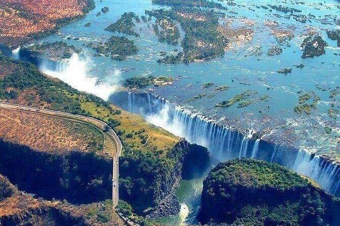 Victoria Falls Helicopter Tour with Guide - Entering the air above Victoria Falls